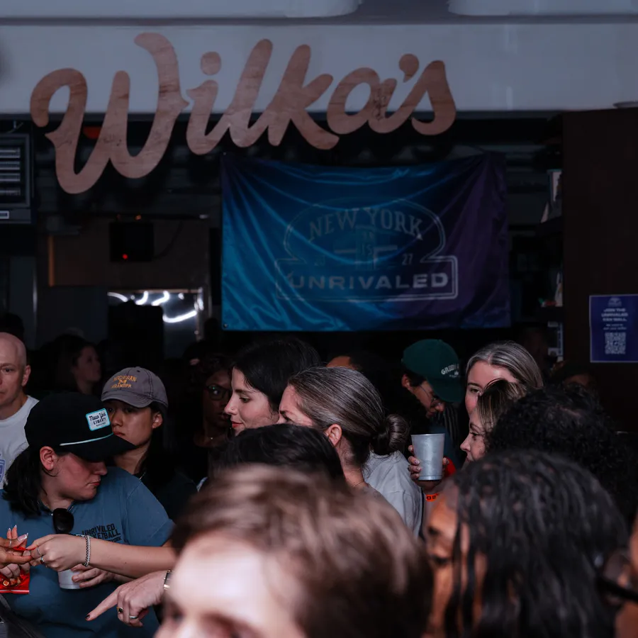 The crowd at Wilka’s under the New York is Unrivaled banner